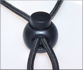 This is a round, ball style Cord Toggle (cordlock, cord grip).
