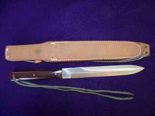 micarta comes with a tan johnson rough back jack crider special b