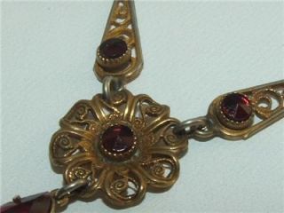 Vintage Art Deco brass and bezel set red rhinestone necklace