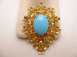 description this is a beautiful denicola brooch the center stone is