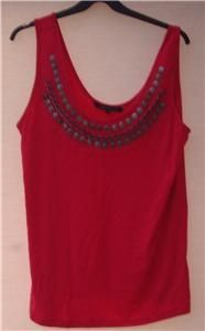 19 it is sleeveless it is 95 % viscose 5 % elastane the trim is 100 %