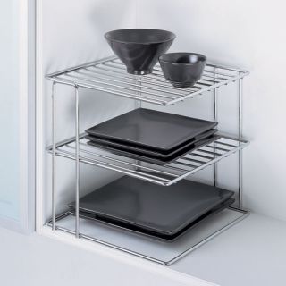 Simply designed corner shelf in chrome finish. 3 shelves for storage
