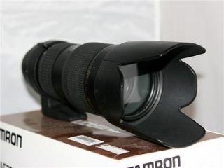 Comes with box, factory Tamron lens bag, lens hood, rear lens cap and