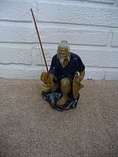  FISHING POLE AND FISH GLAZED MUDMAN VINTAGE DETAILE CLAY POTTERY