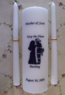  candle has a black shadow of a Fireman and his Bride . The Bride
