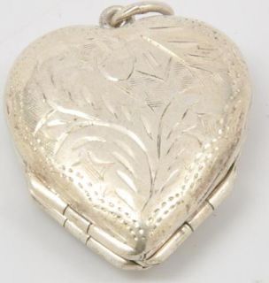 925 Sterling Silver Heart Locket Folds Out to Clover Pattern