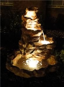 lighted stone springs outdoor water fountain