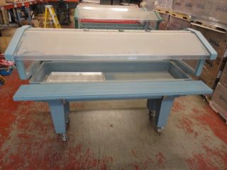  is a rolling food service cart by Cambro. This is a four wheel cart
