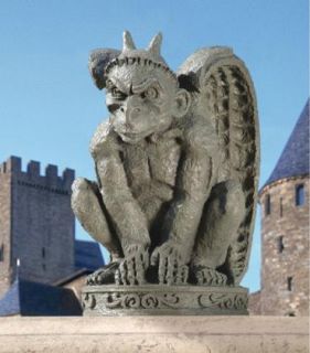 menacing gargoyle sculpture medieval statue