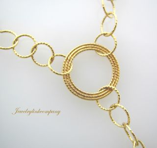  inches necklace with a 4 drop Circular pendant in 14K two tone gold