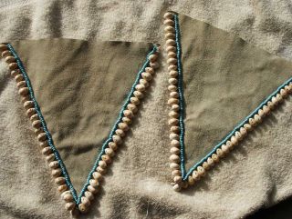 Hide Beaded Shell Pair of Dress Attachments