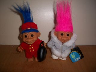  . BOTH TROLLS ARE APPROX. 4 1/2 TALL, NOT INCLUDING THEIR HAIR