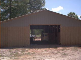 36X36X8 6 Stall Center Isle Horse Barn Enclosed T 111 with open Center
