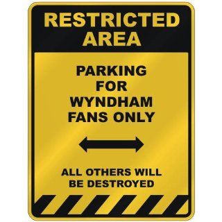 RESTRICTED AREA  PARKING FOR WYNDHAM FANS ONLY  PARKING