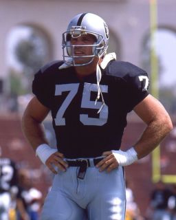 Howie Long Photo in Action Oakland Raiders C