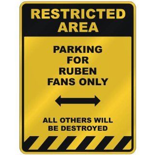 RESTRICTED AREA  PARKING FOR RUBEN FANS ONLY  PARKING