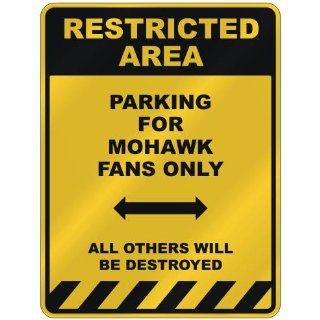 RESTRICTED AREA  PARKING FOR MOHAWK FANS ONLY  PARKING SIGN NAME