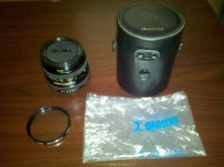  Minolta XG1 SLR Camera, Rokkor X 45mm 12 Lens, Sigma f/2.8 28mm Lens