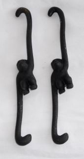 Vintage Cast Iron Monkey Hooks