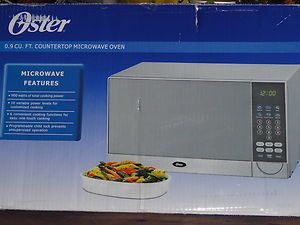 Oster 0 9 CU ft 900 Watts Countertop Microwave Oven OGB5901