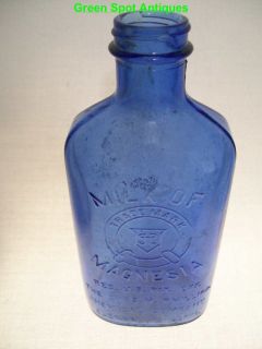 Vintatge Blue Milk of Magnesia Embossed Bottle