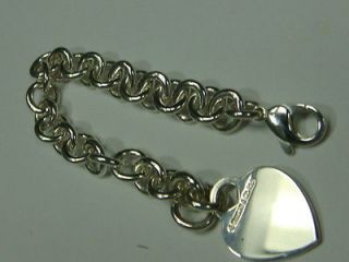 Authentic Tiffany Co. . Lock Charm Bracelet   Sterling Silver MSRP $
