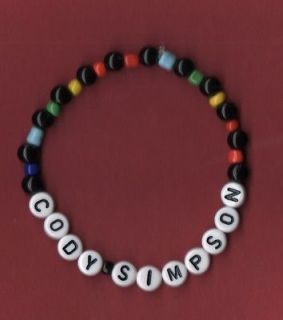 Handmade Rainbow Mix Customise/Pers onalise favourite band caption