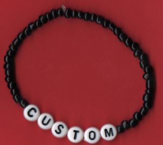 Handmade bracelet with choice of caption and colour or personalise