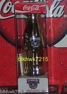 NASCAR 50TH ANNIVERSARY GOLD TONED 8 OUNCE GLASS COCA   COLA BOTTLE