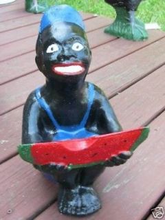 https://39e11f530ac199d88d21-ae97a4e66a2c892e7c577142ea27c79f.ssl.cf1.rackcdn.com/161225873_black-watermelon-boy-statue-lawn-jockey-cousinwfree-.jpg