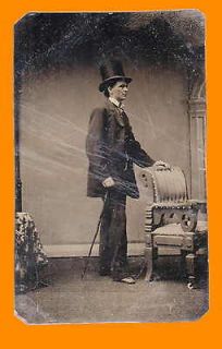 Type of a standing young man in a stove pipe hat from Mid 19th Century
