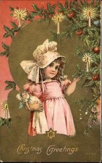 Christmas Little Girl Holding Dolly Tree Gilt Backdrop c1910 Postcard