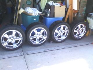 Set of 4 Chrome Arelli Rims and Tires