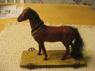  1800S EARLY 1900S GERMAN COMPOSITION SMALL PULL TOY HORSE ON WHEELS