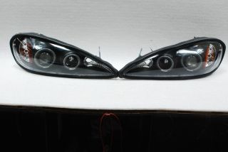 99 05 Grand Am Dual Halo Rim Projector LED Black Headlights Lamps