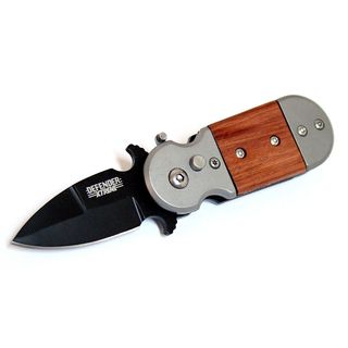 Defender Mini 5 inch Spring assisted Folding Knife (Black/brownBlade materials Stainless steelHandle materials Metal/woodBlade length 2 inchesHandle length 3 inchesWeight 0.4 ouncesDimensions 5 inches long x 2 inches wide x 2 inches highBefore purch