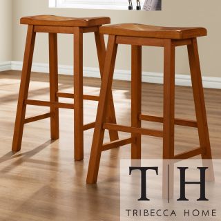 Tribecca Home Salvador Saddle Back 29 inch Oak Stools (set Of 2) (OakMaterials Solid rubberwoodWood finish OakNumber of stools Two Stool Height/Seat Height 29 inchesDimensions 29 inches high x 9 inches wide x 18 inches deepNumber of boxes this will s