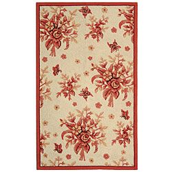 Hand hooked Flov Ivory/ Rose Wool Runner (26 X 4) (IvoryPattern FloralMeasures 0.375 inch thickTip We recommend the use of a non skid pad to keep the rug in place on smooth surfaces.All rug sizes are approximate. Due to the difference of monitor colors,