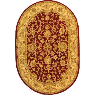 Handmade Antiquities Jewel Red/ Ivory Wool Rug (76 X 96 Oval) (RedPattern OrientalMeasures 0.625 inch thickTip We recommend the use of a non skid pad to keep the rug in place on smooth surfaces.All rug sizes are approximate. Due to the difference of mon