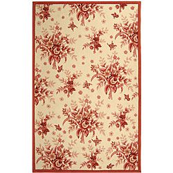 Hand hooked Flov Ivory/ Rose Wool Rug (79 X 99) (IvoryPattern FloralMeasures 0.375 inch thickTip We recommend the use of a non skid pad to keep the rug in place on smooth surfaces.All rug sizes are approximate. Due to the difference of monitor colors, s
