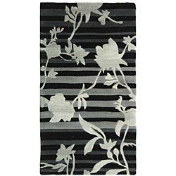 Handmade Portrait Black/ Grey N. Z. Wool Rug (26 X 46) (BlackPattern FloralMeasures 0.625 inch thickTip We recommend the use of a non skid pad to keep the rug in place on smooth surfaces.All rug sizes are approximate. Due to the difference of monitor co