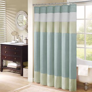 Madison Park Chester Pieced Faux Silk Shower Curtain (AquaMaterials 100 percent polyester faux silk Dimensions 72 inches wide x 72 inches longCare instructions Machine washableThe digital images we display have the most accurate color possible. However