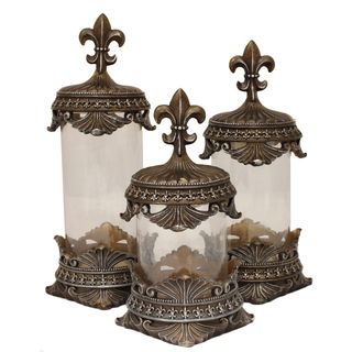 Casa Cortes Decorative Glass Canister (set Of 3) (BronzeQuantity Set of three (3)Lids feature a beautiful fleur de lis lids designLarge piece dimensions 17 inches high x 6 inches wide x 6 inches longMedium piece dimensions 15 inches high x 6 inches wid