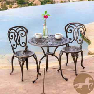 Christopher Knight Home Cornwall 3 piece Cast Aluminum Outdoor Bistro Set (Shinny copperFeatures decorative detail on table and backrestMesh table top and seat restSome assembly requiredSturdy constructionNeutral colors to match any outdoor decorIdeal for