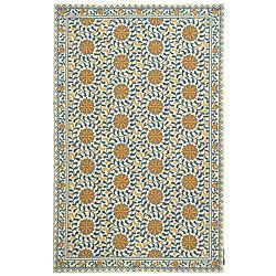 Hand hooked Majestic Ivory/ Blue Wool Rug (39 X 59) (IvoryPattern FloralMeasures 0.375 inch thickTip We recommend the use of a non skid pad to keep the rug in place on smooth surfaces.All rug sizes are approximate. Due to the difference of monitor color